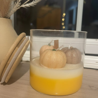 Pumpkin-Shaped autumn harvest candle cap standing with jar and candles in multi-colored